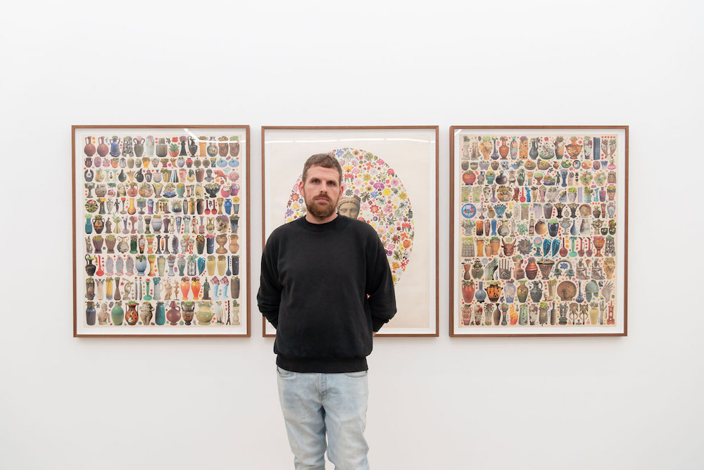 Matthew Craven with his works