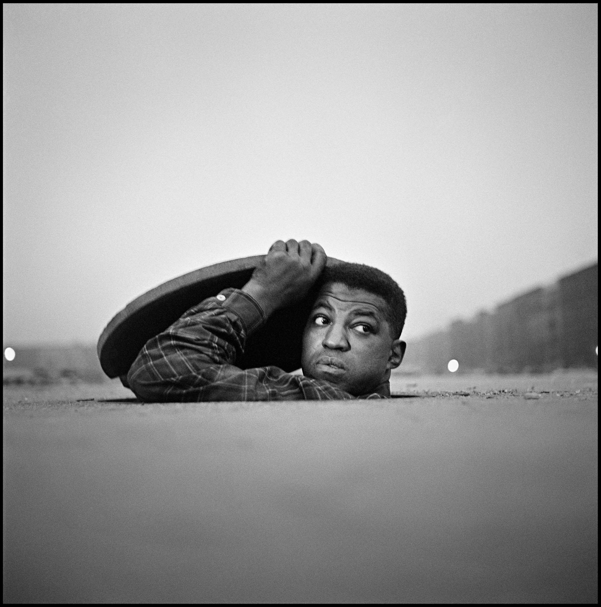 The Invisible Man, Harlem, New York, 1952. Photograph by Gordon Park s . Courtesy of and copyright The Gordon Parks Foundation