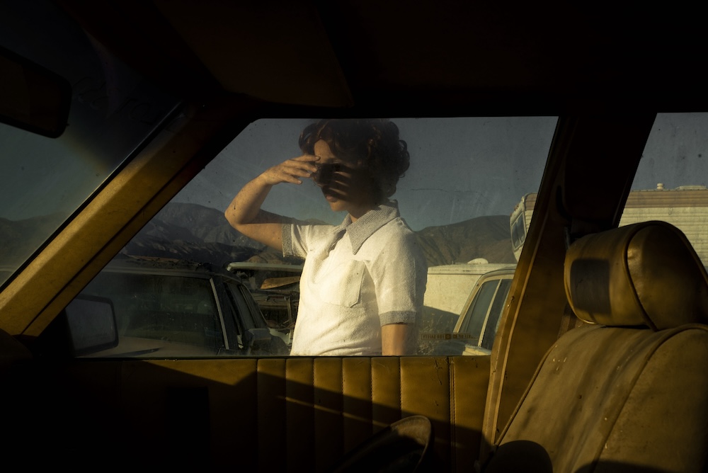 Tania Franco Klein, Car, Window (Self-portrait), from Proceed To The Route, 2018. Archival pigment print, 28 x 41 inch.