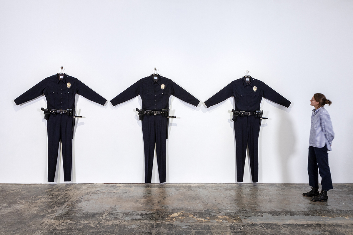 Chris Burden, L.A.P.D. Uniform, 1993. Wool serge, metal, leather, wood, and plastic, 88 x 72 x 6 inches. Edition of 30. Photo credit: Carlos Avendaño.